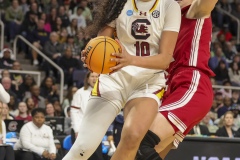 ALBANY, NEW YORK – MARCH 29: South Carolina center KAMILLA CARDOSO (10) drives under the basket past an Indiana defender during the 2024 NCAA Women’s Basketball Tournament Albany 1 Regional semifinal at MVP Arena on March 29, 2024, in Albany, N.Y.  (Scotty Rausenberger/A Lot of Sports Talk)