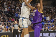 ALBANY, NEW YORK – MARCH 30: UCLA center LAUREN BETTS (51) blocks a shot attempt by LSU forward ANGEL REESE (10) during the 2024 NCAA Women’s Basketball Tournament Albany 2 Regional semifinal at MVP Arena on March 30, 2024, in Albany, N.Y.  (Scotty Rausenberger/A Lot of Sports Talk)