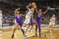 ALBANY, NEW YORK – MARCH 30: UCLA center LAUREN BETTS (51) goes after a closely contested rebound between LSU’s ANGEL REESE (10) and ANEESAH MORROW (24) during the 2024 NCAA Women’s Basketball Tournament Albany 2 Regional semifinal at MVP Arena on March 30, 2024, in Albany, N.Y.  (Scotty Rausenberger/A Lot of Sports Talk)