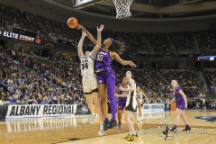 ALBANY, NEW YORK – APRIL 1: LSU forward ANGEL REESE (10) blocks the shot of Iowa’s AJ EDIGER (34)  during the 2024 NCAA Women’s Basketball Tournament Albany 2 Regional Final at MVP Arena on April 1, 2024, in Albany, N.Y.  (Scotty Rausenberger/A Lot of Sports Talk)