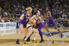 ALBANY, NEW YORK – APRIL 1:  Iowa guard CAITLIN CLARK (22) tries to fend off the LSU defense during the 2024 NCAA Women’s Basketball Tournament Albany 2 Regional Final at MVP Arena on April 1, 2024, in Albany, N.Y.  (Scotty Rausenberger/A Lot of Sports Talk)