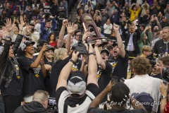 ALBANY, NEW YORK – APRIL 1:  Iowa’s CAITLIN CLARK holds up the regional championship trophy after the 2024 NCAA Women’s Basketball Tournament Albany 2 Regional Final at MVP Arena on April 1, 2024, in Albany, N.Y.  (Scotty Rausenberger/A Lot of Sports Talk)