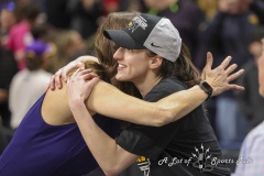 ALBANY, NEW YORK – APRIL 1:  Iowa’s CAITLIN CLARK embraces ESPN anchor REBECCA LOBO after the 2024 NCAA Women’s Basketball Tournament Albany 2 Regional Final at MVP Arena on April 1, 2024, in Albany, N.Y.  (Scotty Rausenberger/A Lot of Sports Talk)