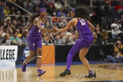 ALBANY, NEW YORK – APRIL 1:  LSU’s ANGEL REESE (10) and FLAU’JAE JOHNSON (4) exchange a high-five after a shot during the 2024 NCAA Women’s Basketball Tournament Albany 2 Regional Final at MVP Arena on April 1, 2024, in Albany, N.Y.  (Scotty Rausenberger/A Lot of Sports Talk)