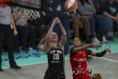 BROOKLYN , NEW YORK— SEPTEMBER 22:  New York Liberty guard Sabrina Ionescu (20) and Atlanta Dream guard Jordin Canada (3) battle for a loose ball during the playoff game between New York Liberty and Atlanta Dream at the Barclays Center on September 22, 2024, in Brooklyn, N.Y. (Scotty Rausenberger/A Lot of Sports Talk)