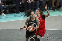 BROOKLYN , NEW YORK— SEPTEMBER 22:   New York Liberty forward Breanna Stewart (30) drives past a Atlanta Dream defender during the playoff game between New York Liberty and Atlanta Dream at the Barclays Center on September 22, 2024, in Brooklyn, N.Y. (Scotty Rausenberger/A Lot of Sports Talk)