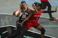 BROOKLYN , NEW YORK— SEPTEMBER 22:   New York Liberty guard Sabrina Ionescu (20) wrestles for a rebound against a defender during the playoff game between New York Liberty and Atlanta Dream at the Barclays Center on September 22, 2024, in Brooklyn, N.Y. (Scotty Rausenberger/A Lot of Sports Talk)